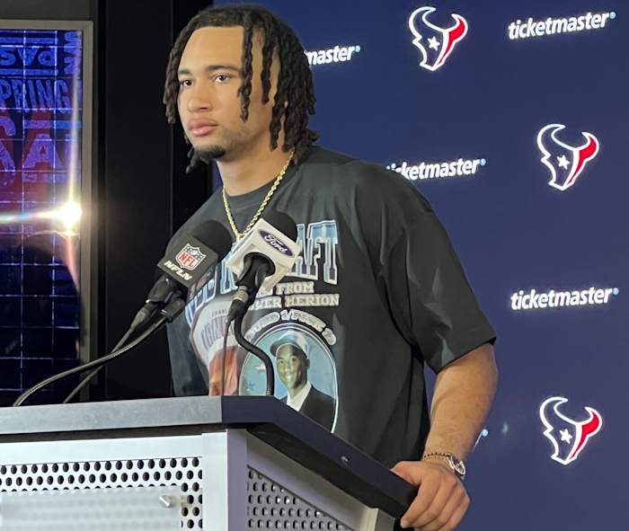 Houston Texans' quarterback C.J. Stroud wearing a shirt that features basketball legend Kobe Bryant.